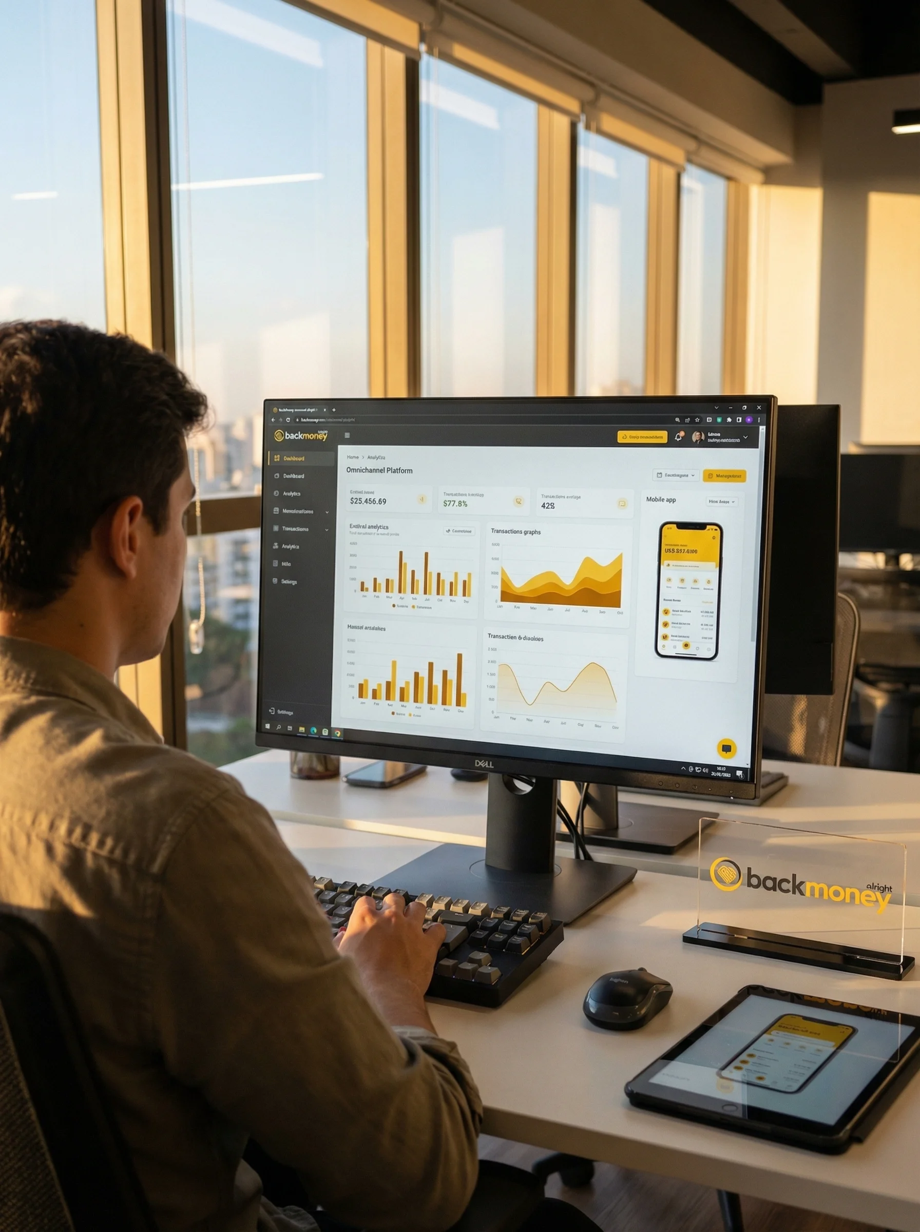 Empreendedor analisando dashboard omnichannel BackMoney em monitor widescreen
